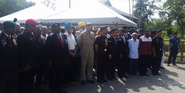 Some Sikhs (Bhagat Singh in front row in blue turban and Morgan Singh in yellow turban) at the 70th anniversary of the landing of the Indian forces at the Morib beach.